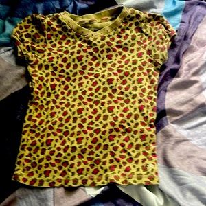 A cheetah print kid shirt